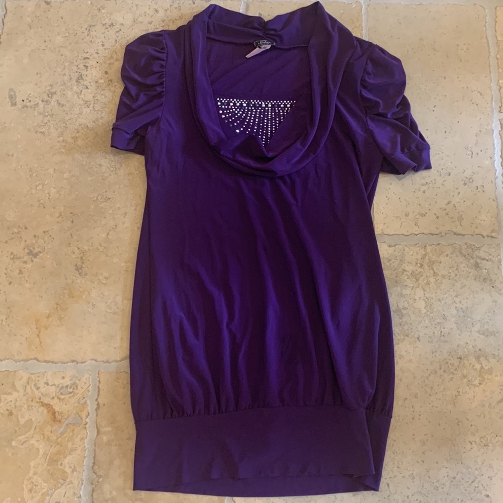 A cute purple top in the brand solar